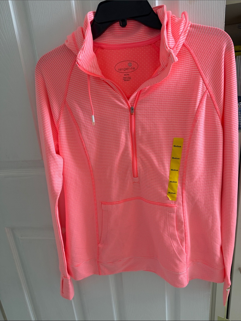 Tangerine brand women's 1/2-zip athletic hoodie, featuring neon coral/pink